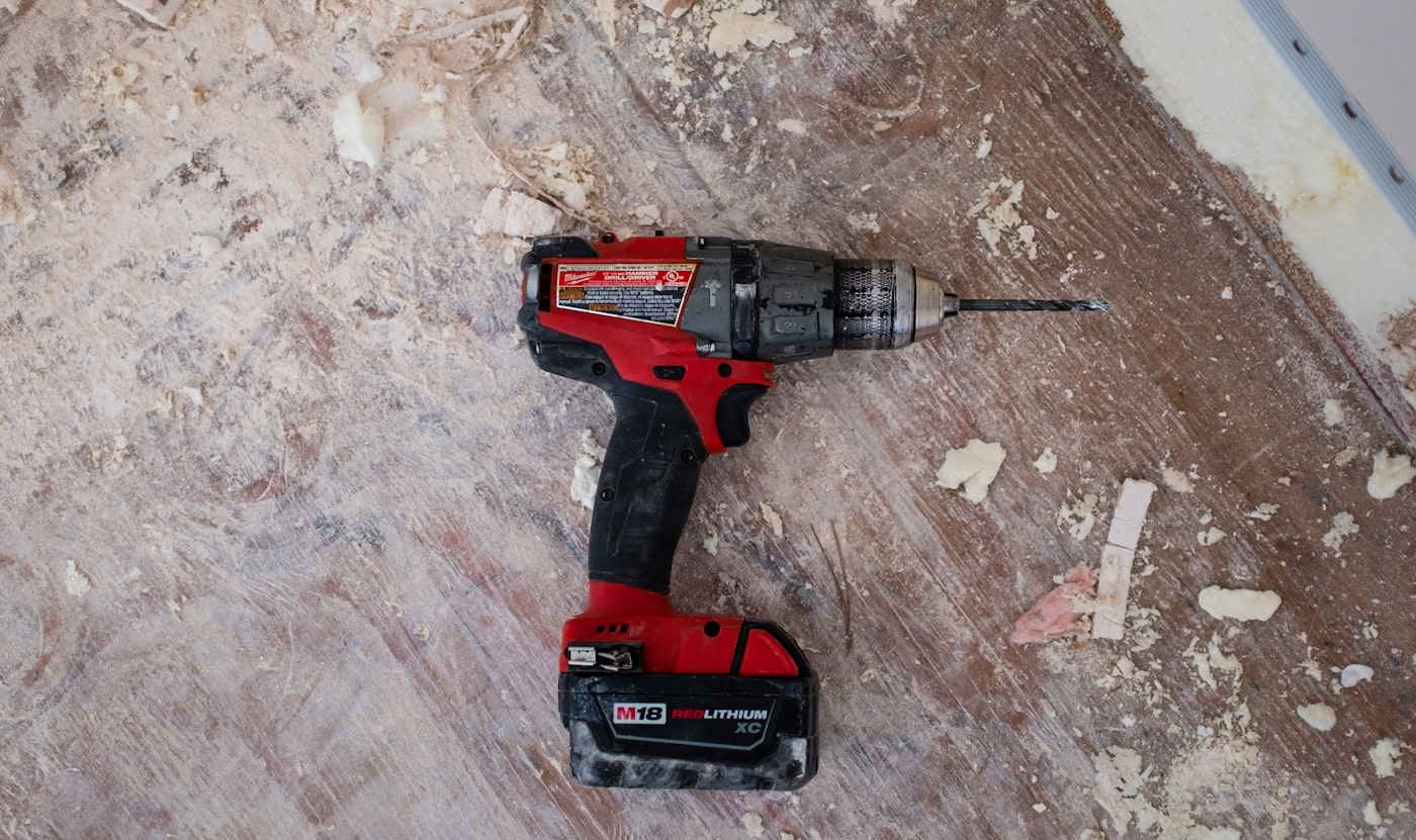 Drill on a dusty jobsite floor